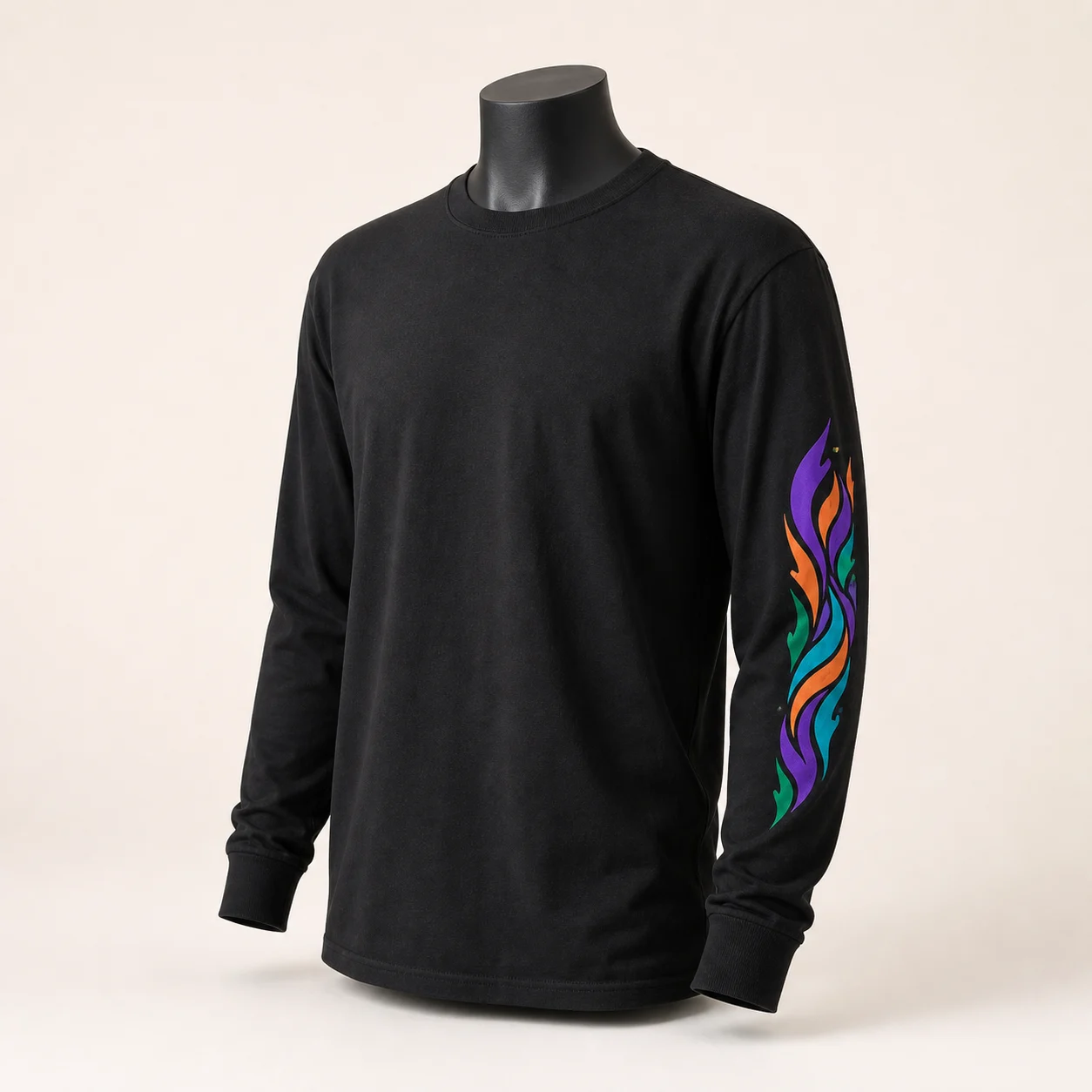 Illustrative mockup of a black long-sleeve T-shirt with a narrow colorful abstract DTF print down the outer sleeve